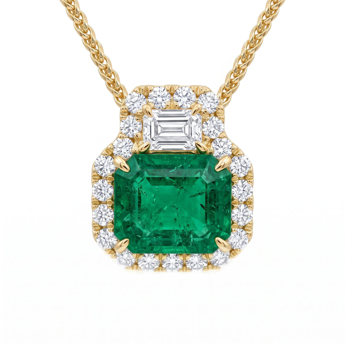 EP057043Y - Pendant 18KY/1.2G 1EMER-1.17CT 1DIA-0.16CT 21RD-0.20CT