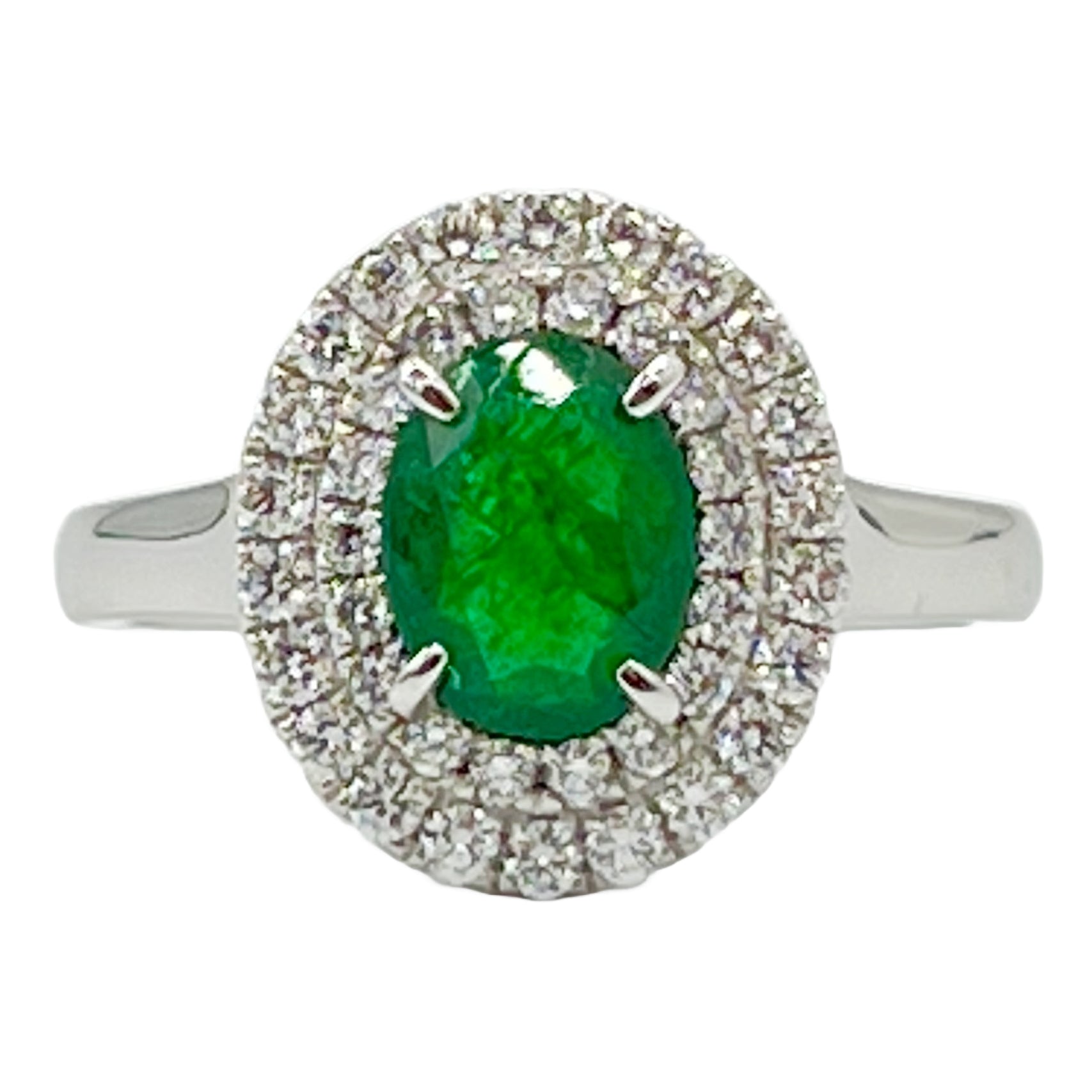 Ring 18KW/4.7G 1EMER-0.98CT 40RD-0.46CT
