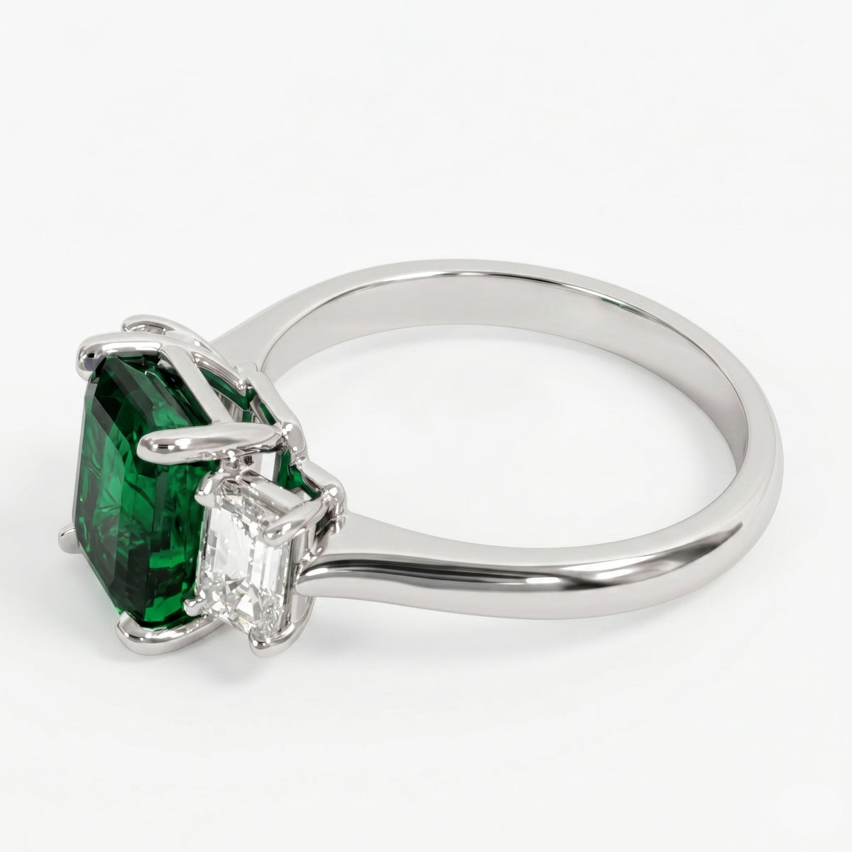 ER057069 - Ring 18KW 1EMER-1.88CT 2EC-0.78CT